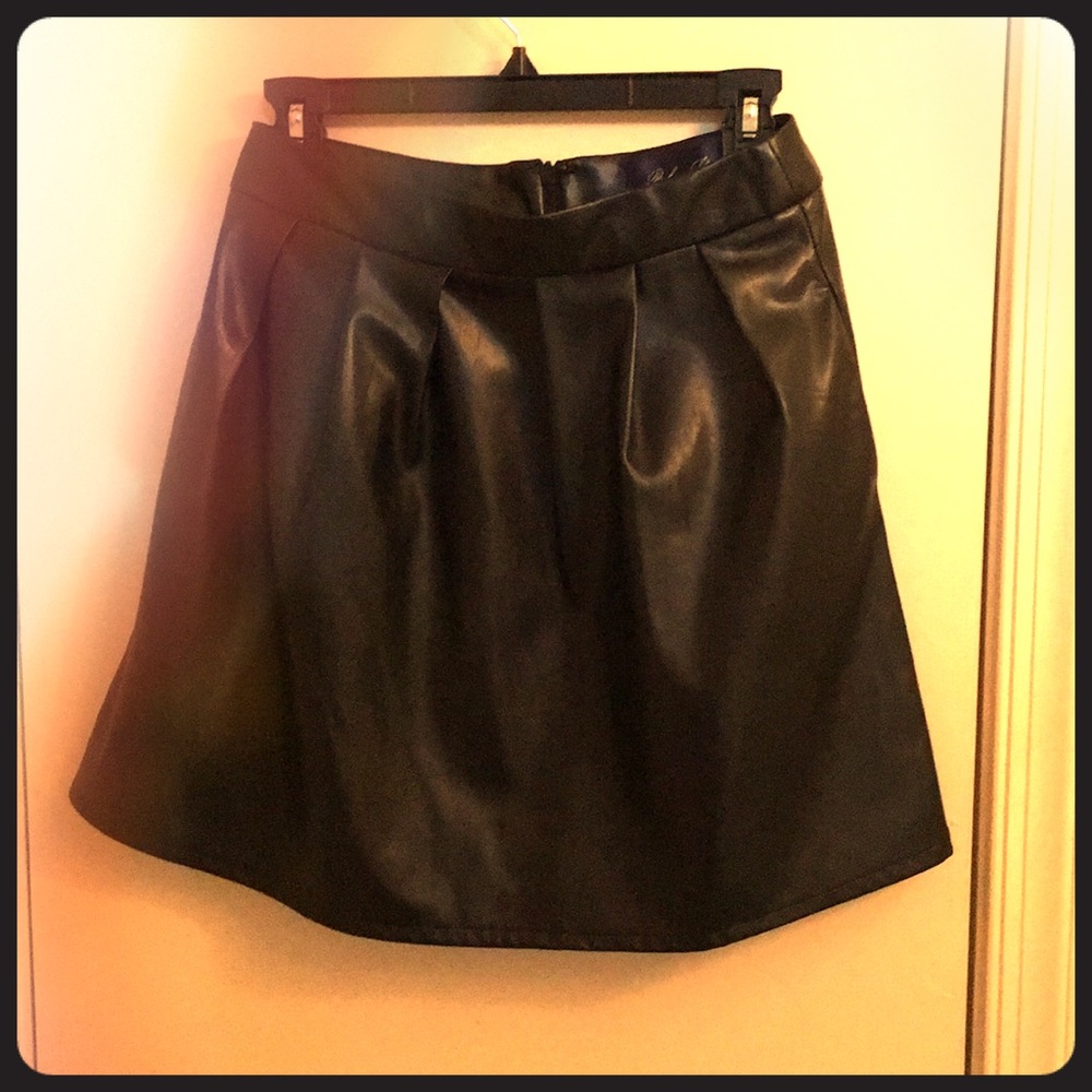 Black “leather,” high-waisted skirt